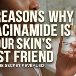 A dropper dispensing clear niacinamide serum onto a woman's glowing cheek.