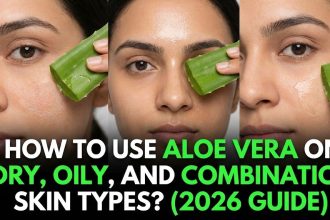 A woman gently applying clear, soothing aloe vera gel to her face, surrounded by fresh green aloe leaves.