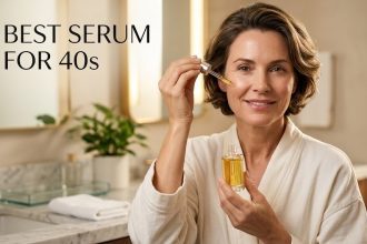 A luxury glass dropper bottle of anti-aging serum being applied to healthy, mature skin.