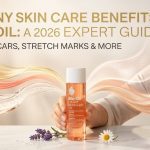 A bottle of Bio-Oil sitting on a white surface next to fresh lavender sprigs and chamomile flowers, illustrating its botanical ingredients.